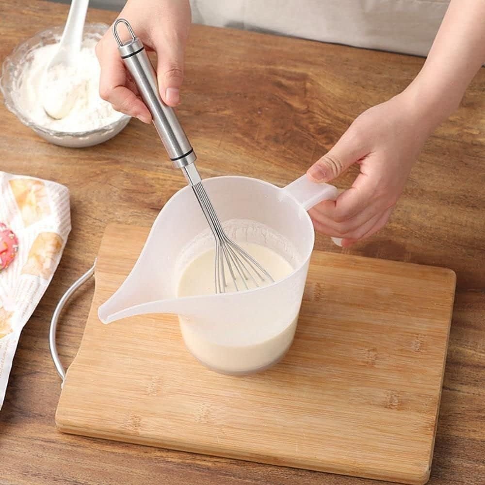 Pichet en plastique gradué 1L — Bec verseur long - cuisine inspirante